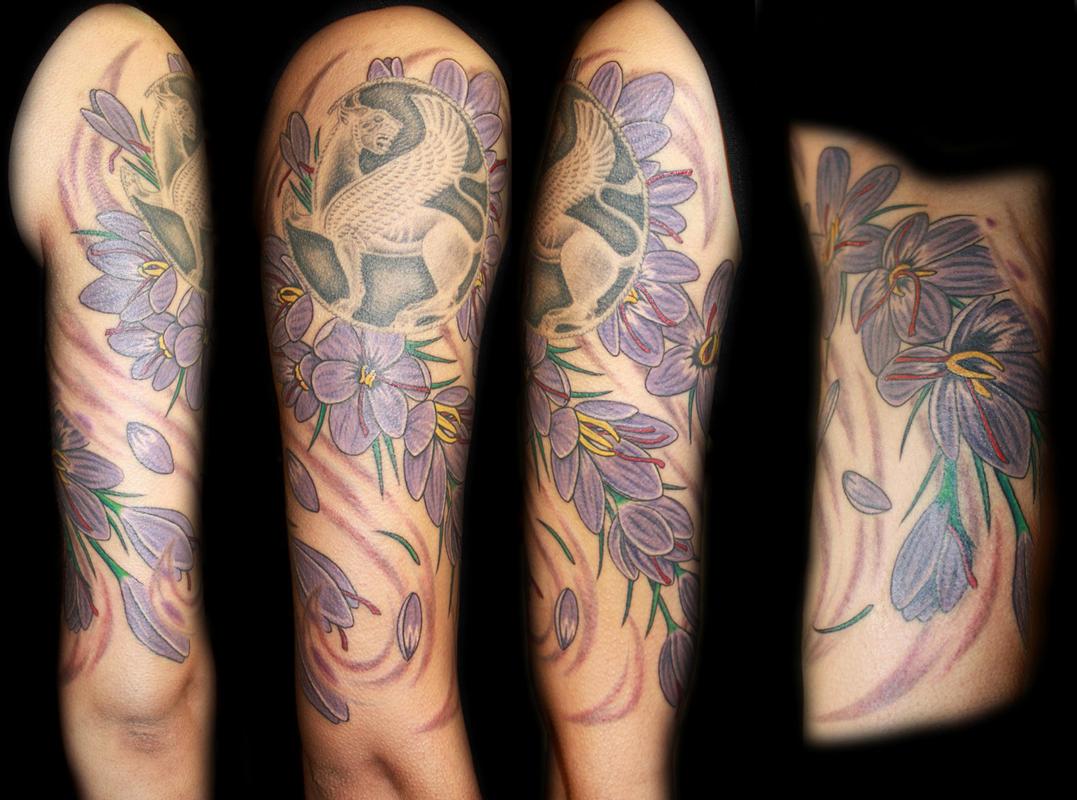 saffron flowers color half sleeve tattoo by Angela Leaf TattooNOW